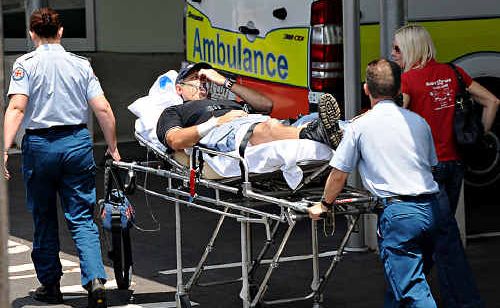 Gympie Police Detective Senior Constable Gavin Cummings is wheeled into Gympie Hospital Emergency department after accidentally shooting himself in the leg during a training exercise. Gympie Police Detective Senior Constable Gavin Cummings is wheeled into Gympie Hospital Emergency department after accidentally shooting himself in the leg during a training exercise.